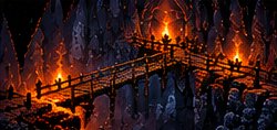 A torch-lit bridge deep underground